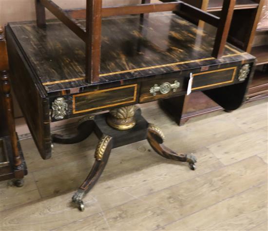 A Regency coromandel sofa table fitted two short drawers, satinwood line-inlaid, ormolu-mounted and parcel-gilt (in need of restoration